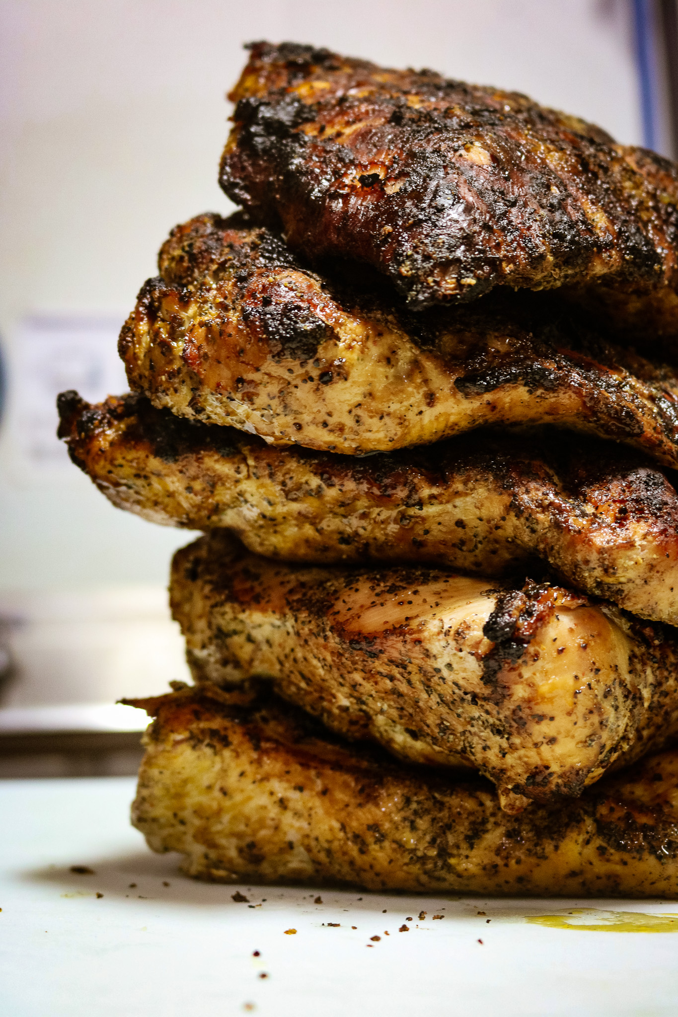 Stack of herb-grilled chicken breasts